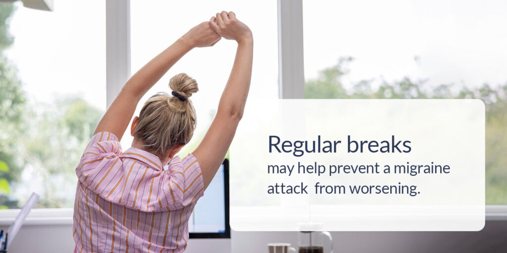 a woman stretches her arms in front of a window with the words "regular breaks may help prevent a migraine attack from worsening"